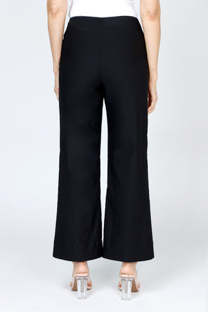 Holland Ave Lizzie Patch Pocket Wide Leg Pant in Black.  Pull on pant with faux zipper placket and button.  2 front patch pockets.  2 rear patch pockets.  Snug through stomach, relaxed through hip and leg.  10" leg opening.  28" inseam._59765783658862