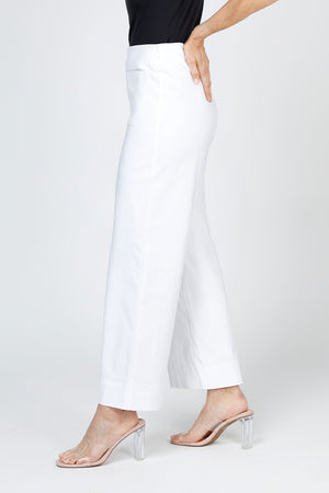 Holland Ave Lizzie Patch Pocket Wide Leg Pant in White.  Pull on pant with faux zipper placket and button.  2 front patch pockets.  2 rear patch pockets.  Snug through stomach, relaxed through hip and leg.  10" leg opening.  28" inseam._59765783757166