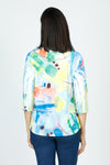 Top Ligne Watercolors V neck Top in Multi.  Bright abstract print on white.  V neck, with overlapping band.  3/4 sleeve.  Stamped, perforated fabric.  A line shape.  Relaxed fit._t_59584572326254