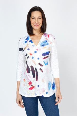 Top Ligne Splashes Button Back Tunic.  Multi color splashes on white.  V neck with faux 2 button placket.  3/4 sleeve Back yoke with center buttons.  Curved hem. Relaxed fit._59777400242542