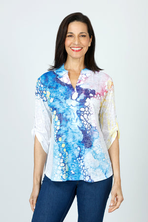 Top Ligne Fizzy Waves Mandarin Collar Top in Blue.  Mandarin collar split neck top with 2 button placket.  3/4 sleeve with button tab.  High low curved hem.  Relaxed fit._59584620462446