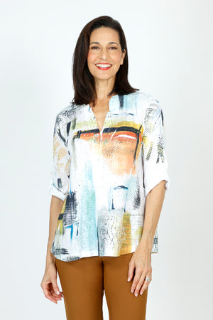 Top Ligne Abstract Artsy Henley in Multi.  Soft multi colored abstract screen print on white.  Mandarin collar split neck textured knit with 2  button placket.  Single breast pocket.  Elbow length roll tab sleeve. Clear sequin trim on collar and pocket.  Relaxed fit._59584685998446