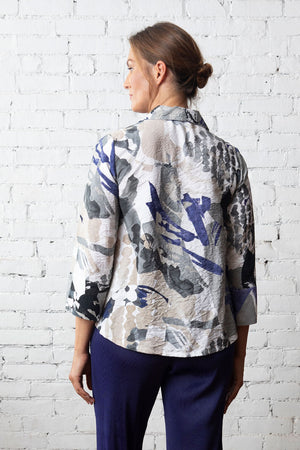 LIV by Habitat Crinkle Snap Shacket in Black.Black gray blue and white abstract splash print. Convertible collar snap front hybrid blouse/jacket with hidden snap placket. 3/4 sleeve with split cuff. 2 front welt pockets. High low hem. Relaxed fit._59816911864174