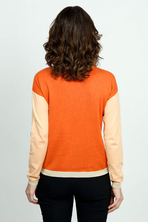 Elliott Lauren Tipping Point Sweater in Peach.  Crew neck color block long sleeve sweater.  Light peach front and dark peach  back with lurex metallic trim at hem and cuff.  Drop shoulder.  Relaxed fit._52885911535982