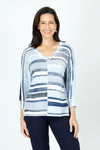 Elliott Lauren Blue Skies Sweater in Blue.  Variable width stripes in front; split down the center.  Back narrow stripes.  V neck, dolman 3/4 sleeve.  Raised center front seam.  Rib trim at neck, hem and cuff.  Side slits. Relaxed fit._t_59719679967598