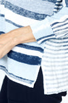 Elliott Lauren Blue Skies Sweater in Blue.  Variable width stripes in front; split down the center.  Back narrow stripes.  V neck, dolman 3/4 sleeve.  Raised center seams.  Rib trim at neck, hem and cuff.  Side slits. Relaxed fit._t_59719680033134