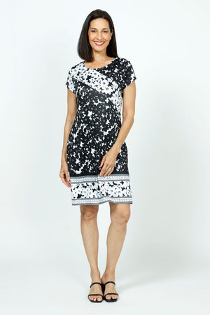 Top Ligne Floral Print Dress in Black & White.  Mix of floral prints with diagonal contrasting print in front and at border.  Crew neck short sleeve dress.  Fully lined.  Classic fit._35731062751432