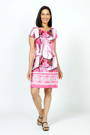 Top Ligne Abstract Print Dress in PInk.  Geometric print in shades of pink white and black with bold pink and white geometric border print.  Crew neck short sleeve dress.  Fully lined.  Relaxed fit._35731040174280