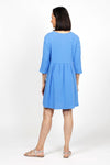 Organic Rags Gauze Dress in Cornflower blue. Cotton gauze scoop neck dress with high waist. 3/4 sleeve. 2 front patch pockets_t_35134153588936