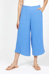 Organic Rags Gauze Pocket Crop in Cornflower blue. Pull on cotton gauze pant with 3/4" contoured flat front waistband, elastic back. Falls straight through the hip, thigh and leg. 2 front pockets. 22" inseam._t_35151267922120