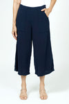 Organic Rags Gauze Pocket Crop in Navy. Pull on cotton gauze pant with 3/4" contoured flat front waistband, elastic back. Falls straight through the hip, thigh and leg. 2 front pockets. 22" inseam._t_35729899716808