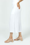 Organic Rags Gauze Pocket Crop in White. Pull on cotton gauze pant with 3/4" contoured flat front waistband, elastic back. Falls straight through the hip, thigh and leg. 2 front pockets. 22" inseam._t_35729899913416