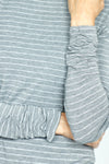 Elliott Lauren Shimmer Stripe Top in Gray with silver metallic stripes. Banded crew neck long sleeve tee. Ruched detail at sleeve cuff. Straight hem. Relaxed fit._t_35905448214728