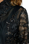 Frederique Sequin Floral Jacket in Black.  Adjustable wire collar button down jacket.  3/4 sleeve with tulip hem.  Soutache floral ribbon with gold sequin trim on black mesh.  Mesh lined.  A line shape.  Relaxed fit._t_59570268111214