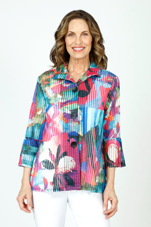 Frederique Abstract Floral Mesh Jacket in Multi.  Bright floral print.  Alternating strips of solid fabric and mesh with a perforated look. Wired convertible collar, button down with 3 oversized black buttons.  3/4 sleeve with tulip pleated cuff. A line shape.  Relaxed fit._59651577971054