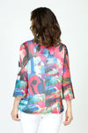 Frederique Abstract Floral Mesh Jacket in Multi.  Bright floral print.  Alternating strips of solid fabric and mesh with a perforated look. Wired convertible collar, button down with 3 oversized black buttons.  3/4 sleeve with tulip pleated cuff. A line shape.  Relaxed fit._t_59651577905518