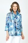 Frederique Watercolor & Lines Mesh Jacket in Blue.  Watercolor print in shades of blue with white stripes. Pieced print with lines in multi directions.  Perforated mesh.  Adjustable wire collar with 3/4 sleeve and tulip hem. Novelty buttons.  A line shape.  Relaxed fit._t_59688477294958