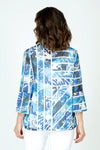 Frederique Watercolor & Lines Mesh Jacket in Blue.  Watercolor print in shades of blue with white stripes. Pieced print with lines in multi directions.  Perforated mesh.  Adjustable wire collar with 3/4 sleeve and tulip hem. Novelty buttons.  A line shape.  Relaxed fit._t_59688477229422