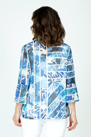 Frederique Watercolor & Lines Mesh Jacket in Blue.  Watercolor print in shades of blue with white stripes. Pieced print with lines in multi directions.  Perforated mesh.  Adjustable wire collar with 3/4 sleeve and tulip hem. Novelty buttons.  A line shape.  Relaxed fit._59688477229422