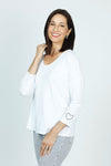 Organic Rags Embossed Heart Top in White.  V neck with double placket.  3/4 sleeve with single embroidered heart at left cuff.  A line shape.  Relaxed fit._t_52915063325038