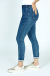 Organic Rags Embroidered  Ankle Jean in Denim.  Medium wash pull on jean with elastic waist.  Floral embroidery on side of right leg.  2 front slash pockets; 2 rear patch pockets.  27 1/2" inseam._t_52915082363246