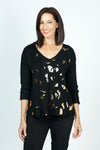 Organic Rags Metallic Knit Top in Black.  Soft knit with gold metallic pieces on front.  V neck with dolman long sleeves.  Rib trim at cuff and hem.  Plain back.  High low hem.  Side slits. Relaxed fit._t_52915074859374