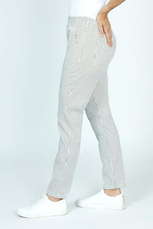 Organic Rags Striped Ankle Pant in Olive and white stripes.  Elastic waistband pull on pant with 2 front slash pockets. 2 rear patch pockets.  Stretchy crinkle fabric.  Slim leg.  27 1/2" inseam._52915087769966