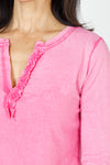 Organic Rags Ruffle Henley in Hot Pink.  Crew neck with split placket. Ruffle trim on 1 side of placket.  3/4 sleeve.  Curved hem.  Relaxed fit._t_59648072876398