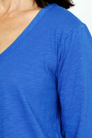 Mododoc 3Q Sleeve V neck Tee in Cosmic Cobalt.  V neck slub cotton tee with 3/4 sleeve.  Curved hem with raw edge.  Relaxed fit._59395408953710