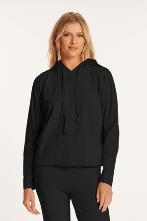 Mododoc Kimono Sleeve Hoodie in Black.  French terry sweatshirt pullover.  Crew neck with attached drawstring hood.  Long dolman sleeves. Front and back center seam detail.  Slightly curved hem.  Rolled edges. Relaxed fit._59622549324142