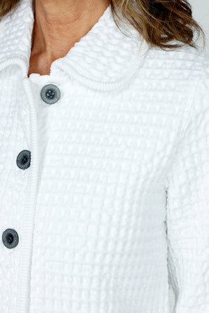 Mododoc Waffle Crop Jacket in White.  Peter pant collar waffle button down jacket.  Long sleeves.  Ribbed velour edging. Relaxed fit._59540865384814