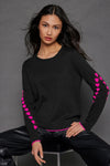 Lisa Todd Love Notes Sweater in Black.  Crew neck long sleeve cotton/cashmere knit.  Pink intarsia knit hearts wrap around sleeves.  Rib trim at neck, hem and cuff.  Pink tipping at hem and cuff.  Relaxed fit._t_52882964250990