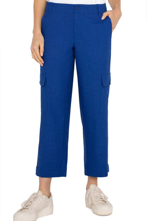 Liverpool Cargo Crop Pant in Blue Topaz.  Stretch twill midrise pant.  Single button and zipper closure.  2 front welt pockets, 2 back patch pockets.  2 side button cargo pockets.  Tab detail at hem.  Comfortable relaxed leg.  Inseam: 26"_36078960869576