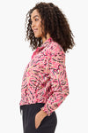 NIC+ZOE Tech Stretch Shadow Floral Jacket in Pink Multi. Stylized floral print in tan, white and black on a pink background. Zip front jacket with a stand convertible collar. Long sleeve with elastic ruffled cuff. Elastic hem. 2 front welt pockets. Relaxed fit._t_35722412654792