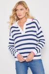 Lisa Todd Stripescape Sweater in White/Blue Galaxy.  Open weave white and navy stripes.  Pointed collar with split v neck.  Crochet collar and placket.  Long sleeves.  Rib trim at hem and cuff.  Pink tipping at collar and cuff.  Relaxed fit._t_59855516172654