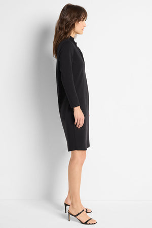 NIC+ZOE Ruffled Up Dress in Black.  V neck dress with 1 snap placket.  Ruffle around neck. Front pleat. In seam pockets.  3/4 sleeve.  A line shape. Relaxed fit._59725624803694