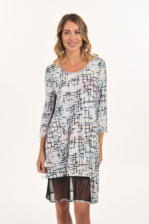 Lemon Grass Mesh Detail Reversible Round Neck Dress in Infinity.  Bright abstract print reverses to black and white print with black mesh inset.  Round neck 3/4 sleeve reversible a-line dress.  Diagonal seaming in front.  Mesh inset on 1 side of front.  A line shape.  Relaxed fit._59706628342126