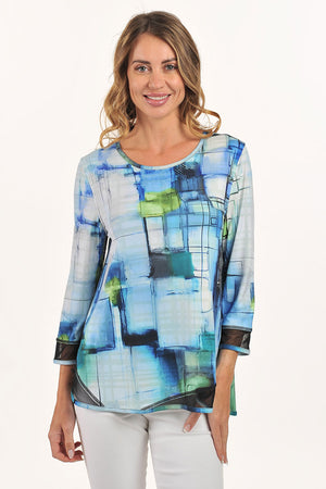 Lemon Grass Abstract Geometric Reversible Round Neck Top in Blue.  Shades of blue and green reverses to green and white grld pattern. Round neck with diagonal black mesh insets at the hem.  3/4 sleeve with mesh cuff.   A line shape.  Relaxed fit._59706695778670