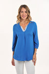 Lemon Grass Contrast Placket Top in Imperial blue.  Crew neck with open v placket.  Striped contrast placket with 3 button trim.  3/4 sleeve with 1/2 elastic cuff.  A line shape.  Relaxed fit._t_59764603126126