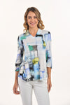 Lemon Grass Hi V Neck Printed Top in Granada Sky.  Geometric print in shades of blue, yellow and black on a white background.  High banded v neck.  3/4 sleeve with button and loop closure.  2 front slits.  Curved hem.  Relaxed fit._t_59764619084142