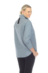 Terra Chic Woven Top in Winter Sky.  Convertible stand collar split neck popover with 2 button placket.  Color block insert on inner placket.  Long sleeves with button cuffs reverse to contrast color.  In seam pouch pockets.  High low hem.  Side slits.  Relaxed fit._t_59403081548142