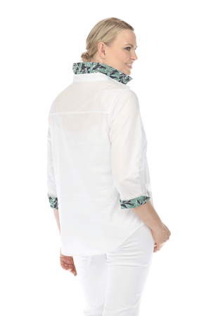 Terra Contrast Collar & Cuff Top.  White popover with navy embroidery and contrast print inner cuff, underside of collar and inner placket.  Pointed collar with 5 button placket.  3/4 sleeve with split turn-back cuff.  Shirt tail high low hem.  Relaxed fit._59698204148078