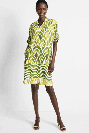 NIC+ZOE Aloe Palms Devon Dress in Green Multi.  Batik-inspired mixed prints with border.  Pointed collar split neck dress with dolman short sleeve.  Front welt pockets.  Side slits.  Relaxed fit._59575260447086