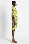 NIC+ZOE Aloe Palms Devon Dress in Green Multi.  Batik-inspired mixed prints with border.  Pointed collar split neck dress with dolman short sleeve.  Front welt pockets.  Side slits.  Relaxed fit._t_59575260414318