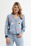 Zaket & Plover Flowers & Spots Cardigan in Jean.  V neck button down cardigan.  Long raglan sleeves.  Intarsia flowers and dots on front with embroidered details.  Contrast tipping.  Light denim front, dark denim back.  Relaxed fit._t_59640221073774