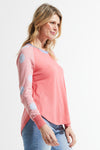 Zaket & Plover Spots & Stripes Sweater in Flamingo.  Crew neck sweater with modified raglan sleeves.  Color blocking on sleeves.  1 sleeve has contrast intarsia dots - the other contrast stripes.  Curved hem. Contrast color rib at neck.  Rib trim at hem and cuff.  High low hem.  Relaxed fit._t_59867403157870