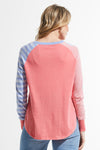 Zaket & Plover Spots & Stripes Sweater in Flamingo.  Crew neck sweater with modified raglan sleeves.  Color blocking on sleeves.  1 sleeve has contrast intarsia dots - the other contrast stripes.  Curved hem. Contrast color rib at neck.  Rib trim at hem and cuff.  High low hem.  Relaxed fit._t_59867403256174