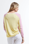 Zaket & Plover Baseball Sweater in Menthol.   Bright seafoam green front; pink sleeves and yellow back.  Pink insets at side seam and neck.  Crew neck with raglan sleeve.  Rib trim at neck, hem and cuff.  Side slits. Relaxed fit._t_59642740539758