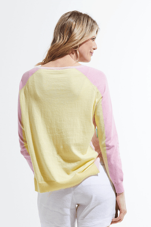 Zaket & Plover Baseball Sweater in Menthol.   Bright seafoam green front; pink sleeves and yellow back.  Pink insets at side seam and neck.  Crew neck with raglan sleeve.  Rib trim at neck, hem and cuff.  Side slits. Relaxed fit._59642740539758