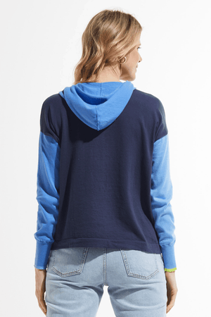 Zaket & Plover Color Block Hoodie in Ink.  Zip up hoodie with attached hood and drawstring.  1/2 front is bright blue, other half navy. Navy back.  1 bright blue sleeve and hood, 1 sleeve light blue.  Kangaroo pouch pockets with contrast color trim.  Rib trim at cuffs. Relaxed fit._59642815119726